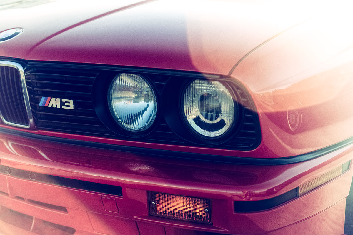 Red BMW E30 M3 flare car photo from Burbbble