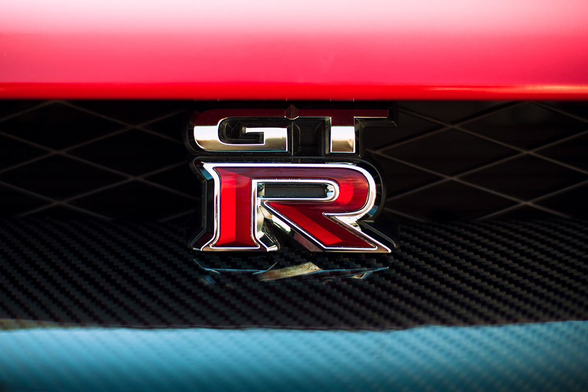 Red Nissan GT-R emblem and grill wallpaper