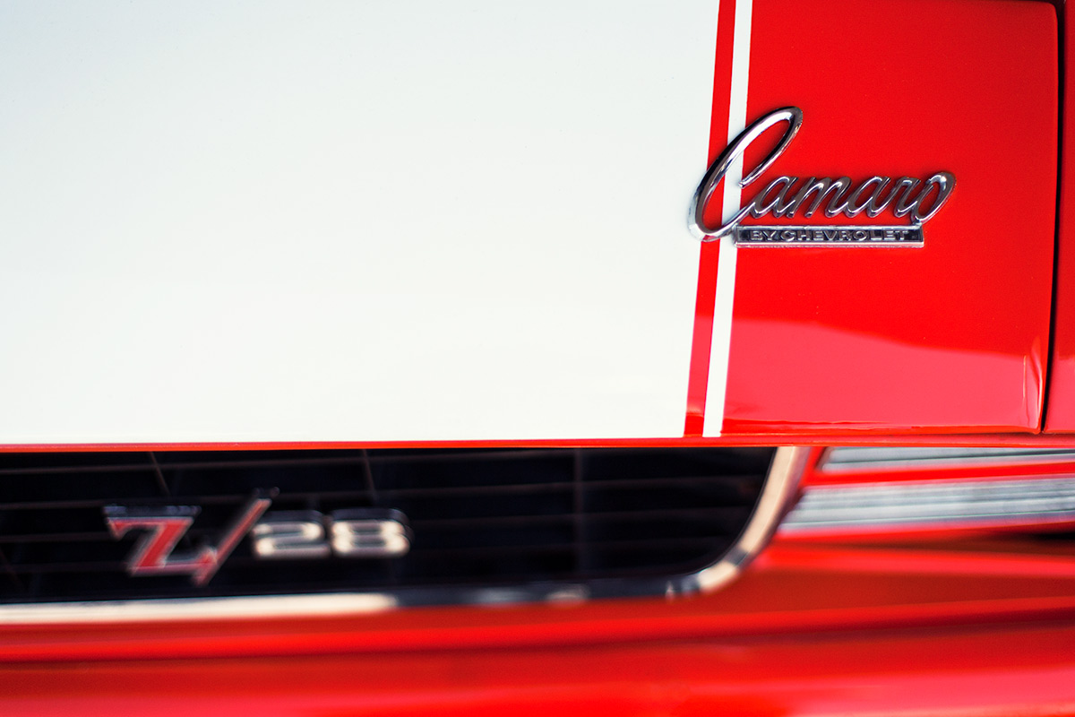 Classic 60s muscle car red Camaro Z28 by Chevrolet