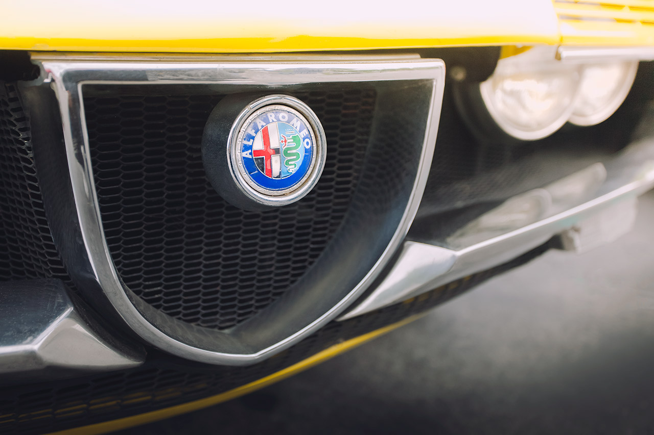 Vintage yellow Alfa Romeo Montreal grill and headlights