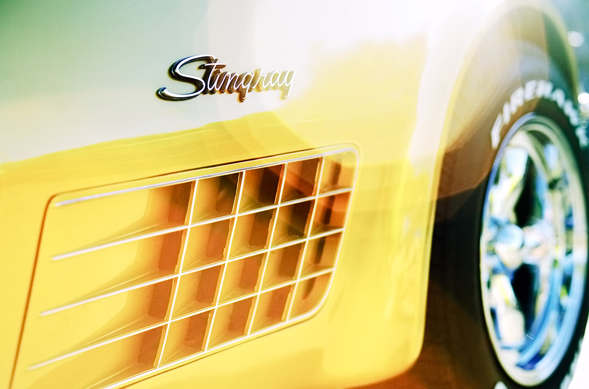 Classic yellow Chevrolet Corvette Stingray car photo from Burbbble