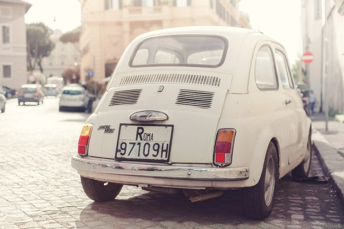 Classic white Fiat 500 in Rome, Italy