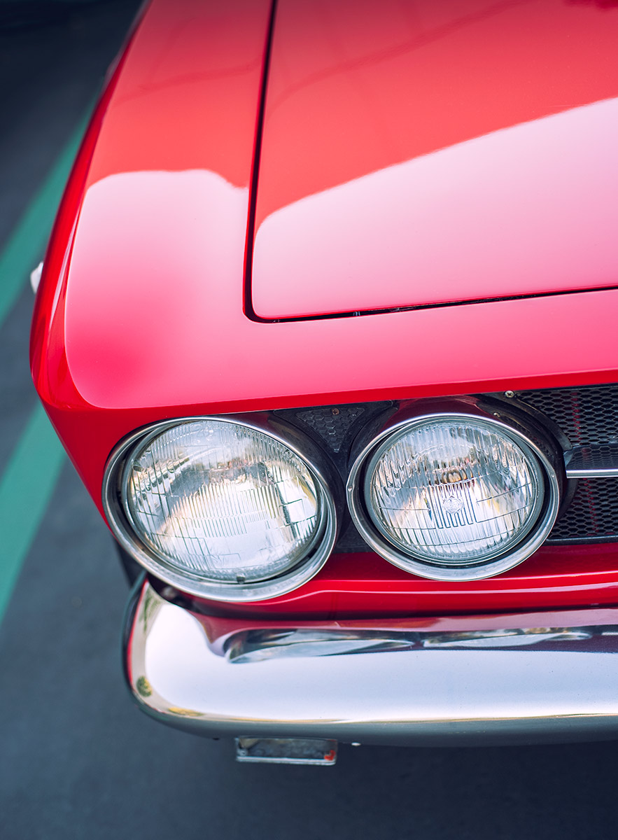 Classic red Alfa Romeo GTV 2000 headlights