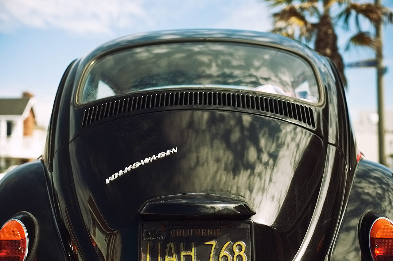Vintage California black plate VW Beetle in Newport Beach